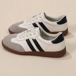 Stylish White and Black Sneakers